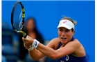 BIRMINGHAM, ENGLAND - JUNE 11: Johanna Konta of the United Kingdom in action against Aleksandra Wozniak of Canada during day three of the Aegon Classic at the Edgbaston Priory Club on June 11, 2014 in Birmingham, England. (Photo by Paul Thomas/Getty Images)